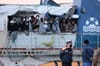 A boat carrying Europe-bound migrants capsizes off Libyan coast