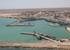 LIBYA’S TRIPOLI PORT HALTS OPERATIONS AS CLASHES ESCALATE